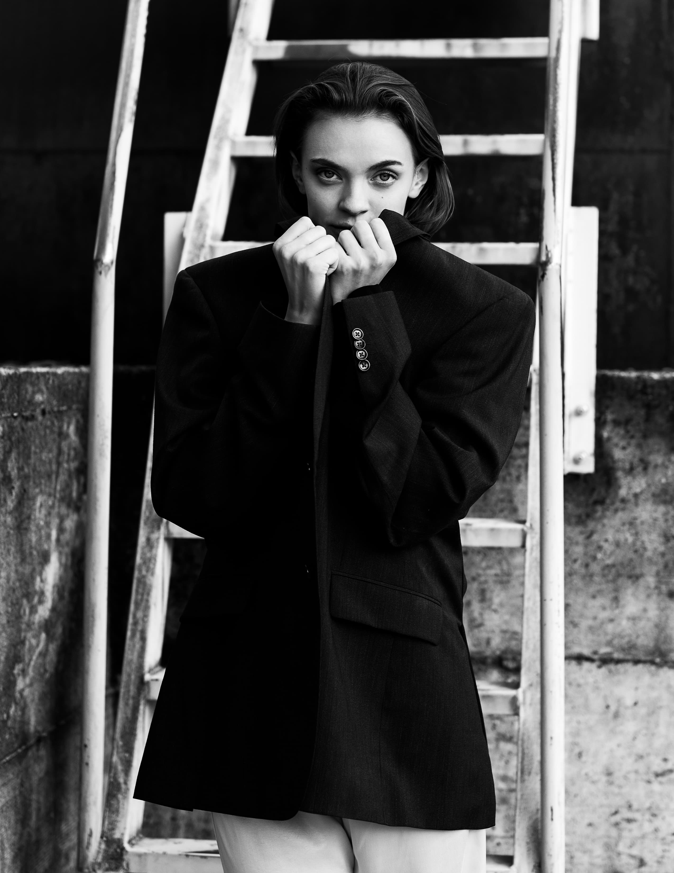 Black and white portrait on concrete steps