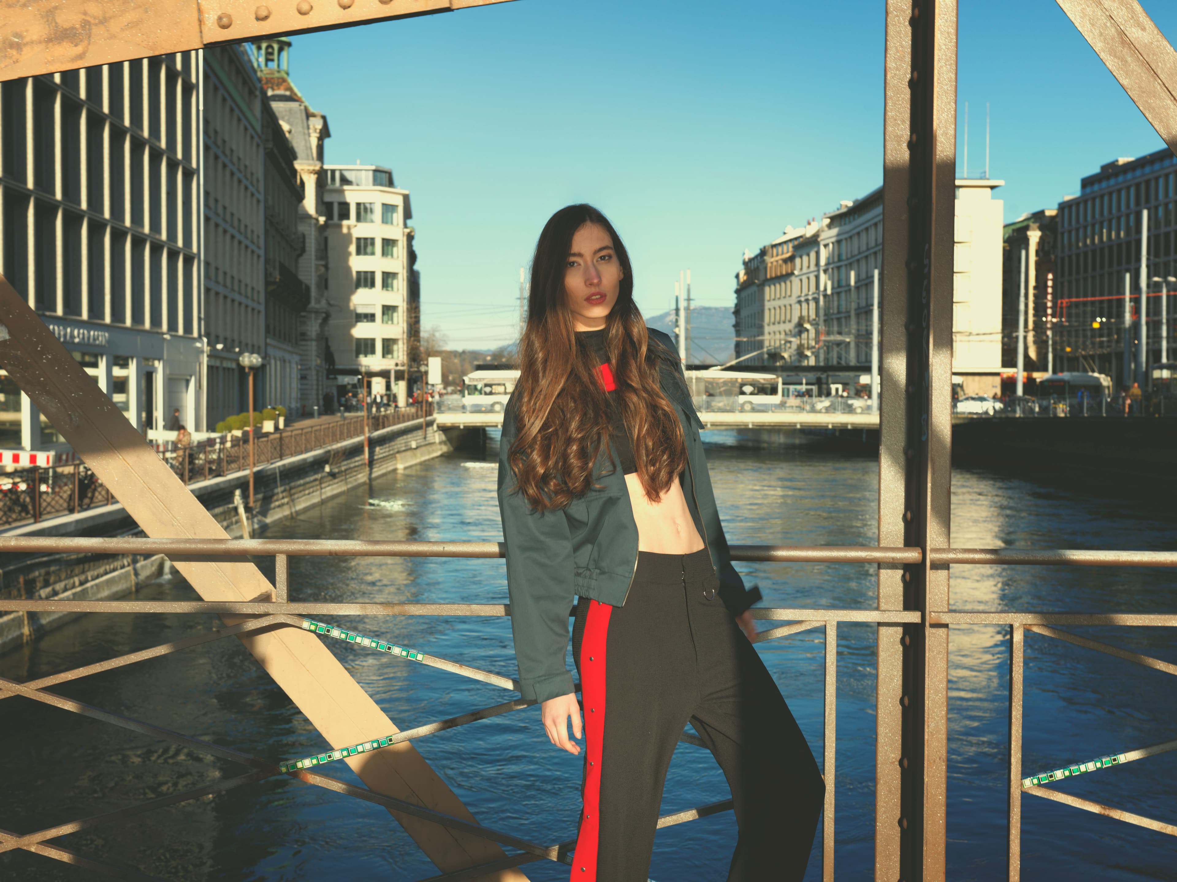 Fashion portrait overlooking a city canal