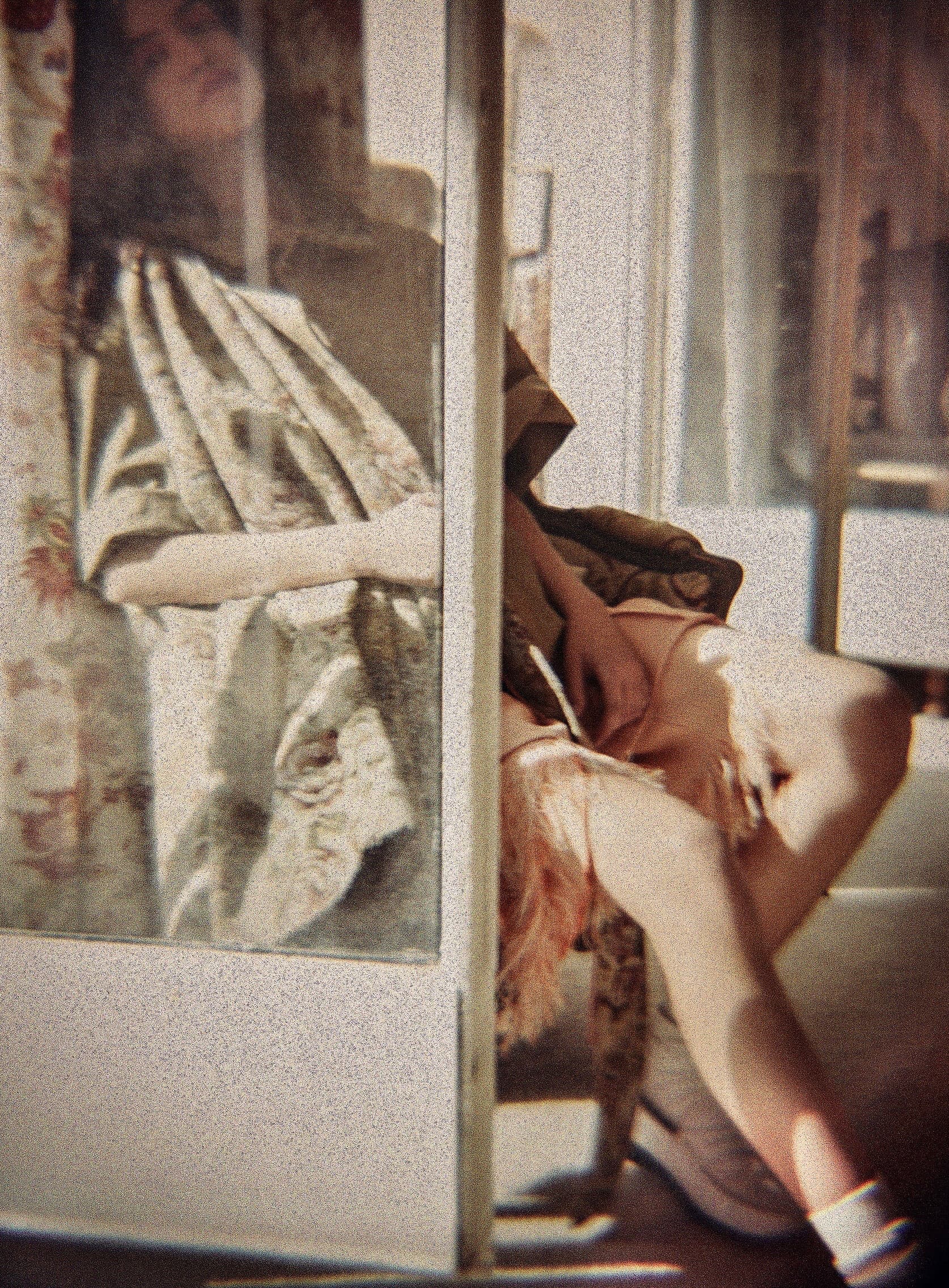 Layered mirror portrait in a domestic interior